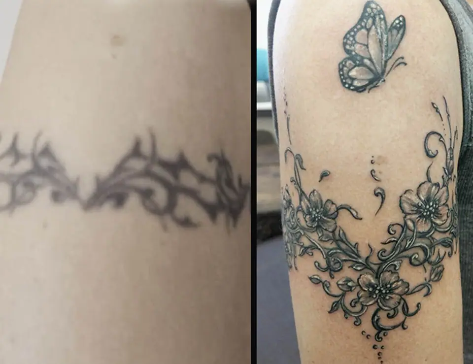 Tatuaje tribal de espinas tapado con un diseño de flores